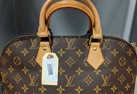 louis vuitton purses at dillard's.